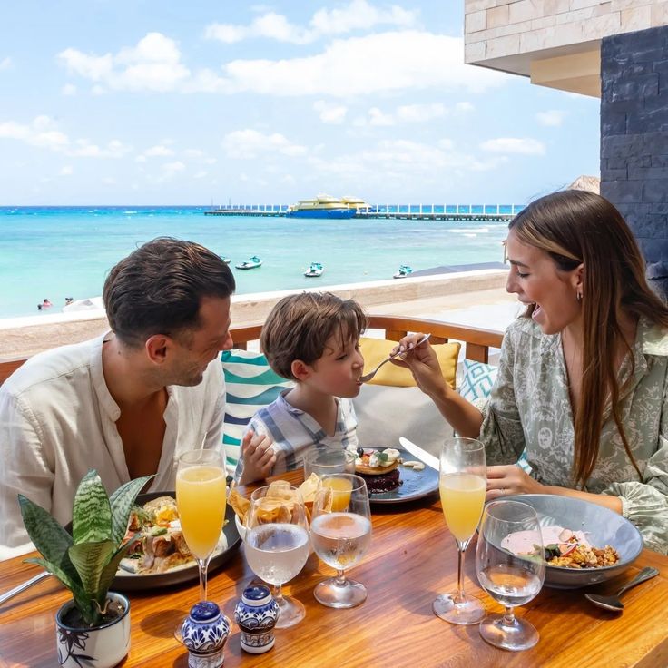 Family dining with ocean view